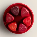 Cofre Rojo Pigmentix Musa para seis esmaltes de 8 ml en estuche redondo rojo.